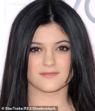 She later explained : 'I was 15 and I was insecure about my lips¿ a guy said, "You have such small lips." From then on, I felt un-kissable.' Kylie pictured in 2012