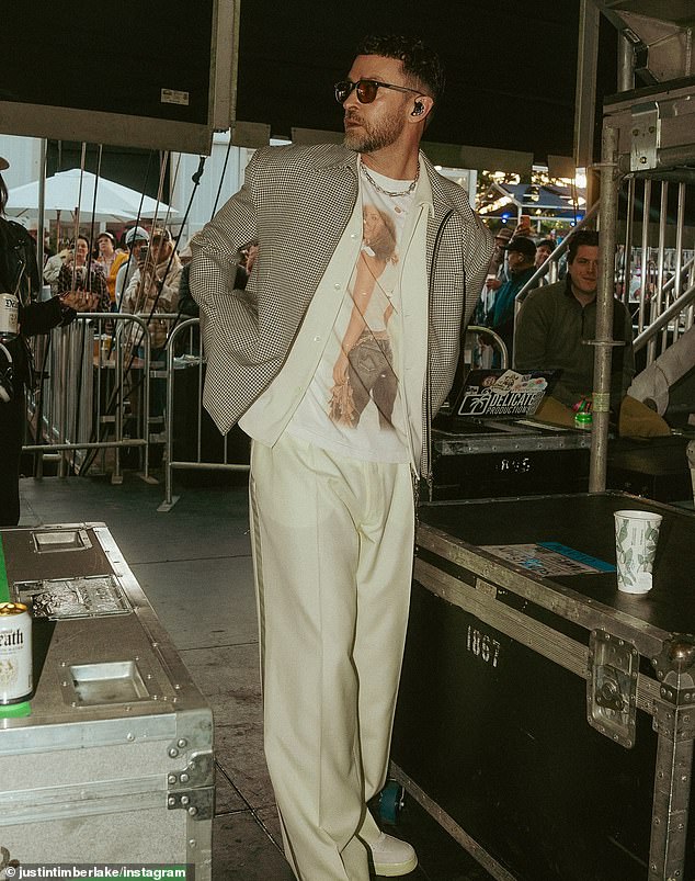 The Grammy winner revealed that his shirt was custom-made and captioned his post showing off his shirt featuring a stunning shot of his wife from her 2004 photoshoot for Giant magazine. 'We out here fan girling,' he wrote in his caption alongside two heart-eye emojis