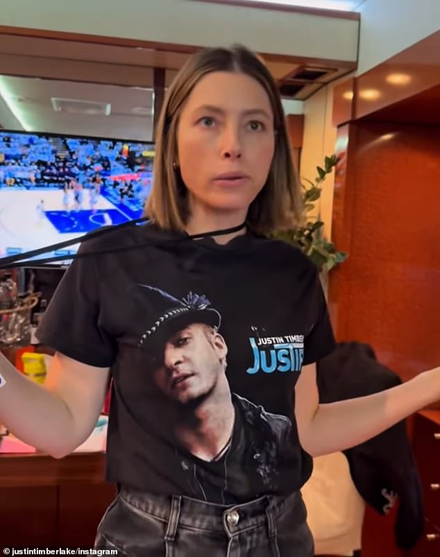 His wife was nonchalant as she showed him her shirt, which had his 2002 debut studio album Justified emblazoned across the front