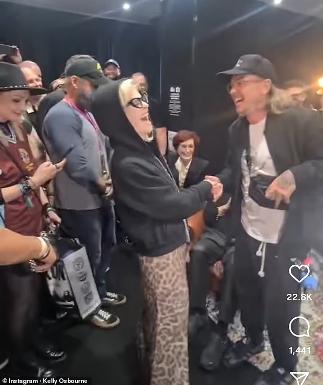 In a surprise backstage moment, Kelly's long-term boyfriend, Slipknot star Sid with whom she shares son Sidney, decided it was the perfect time to propose