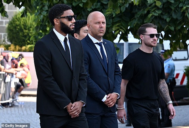 Joe Gomez (left), Arne Slot (centre) and Alexis Mac Allister (right) pictured at Jota's funeral