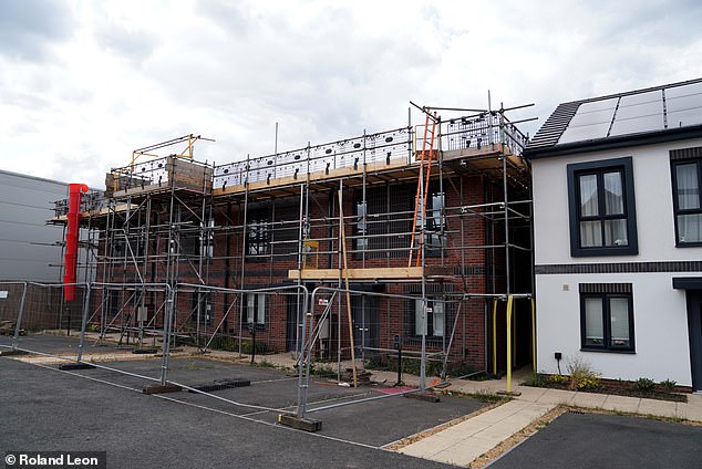 Scaffolding is everywhere and the sounds of diggers and construction are constant