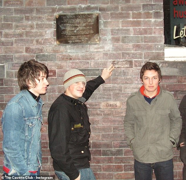 Arctic Monkeys pictured after their name was added to the Wall of Fame in the club