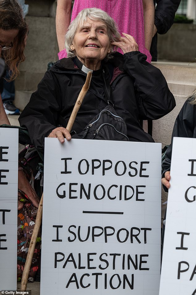 On Saturday a group of supporters, including a priest, an Emeritus Professor and an emergency care worker, just back from Gaza, sat down in front of the Gandhi statue in Parliament Square holding signs saying, "I oppose genocide. I support Palestine Action.