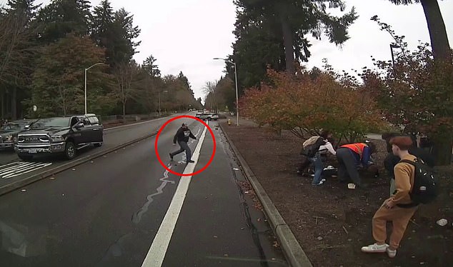 The camera also caught Josh Wagner stop his black Dodge Ram in the middle of the road, get out, and hustle over to the brawl