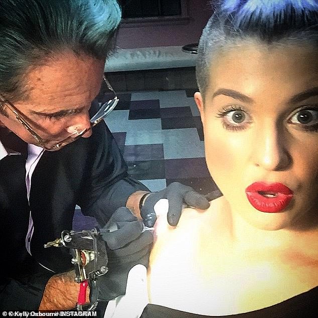 Following Joan's death Kelly got a bumble bee tattoo in tribute to her late pal and the nickname she had given her (pictured)