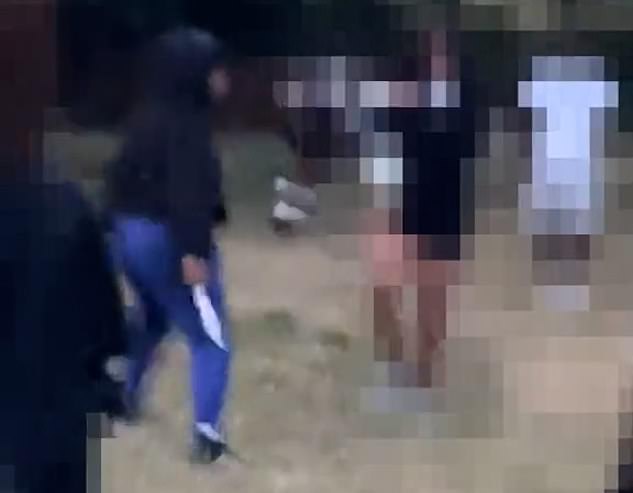 The hooded perpetrator ran up to the girl and brazenly lunged the huge kitchen knife at her