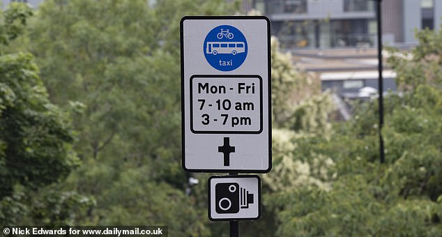Pictured: A sign stating the LTN restriction times on Vanbrugh Hill in East Greenwich, south-east London