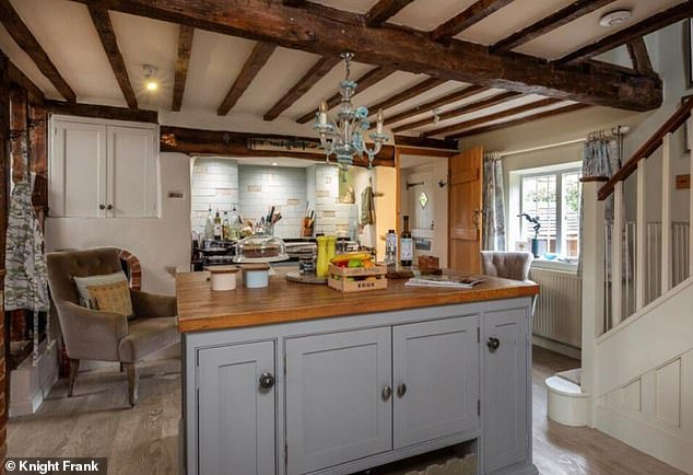Get busy: The kitchen in Rose Cottage has an Aga and high-end units