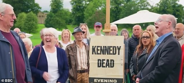 The married couple brought forward a poster that said 'Kennedy dead' with 'Evening Standard' underneath it - rereferring to John F Kennedy's death in 1963