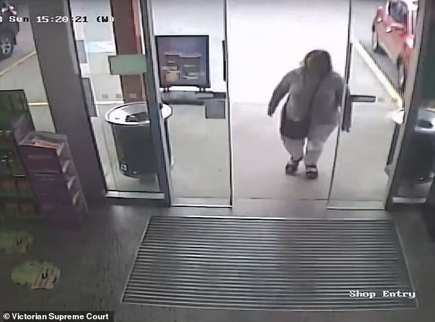 Erin Patterson enters the BP where she went to the toilet for nine seconds and bought food