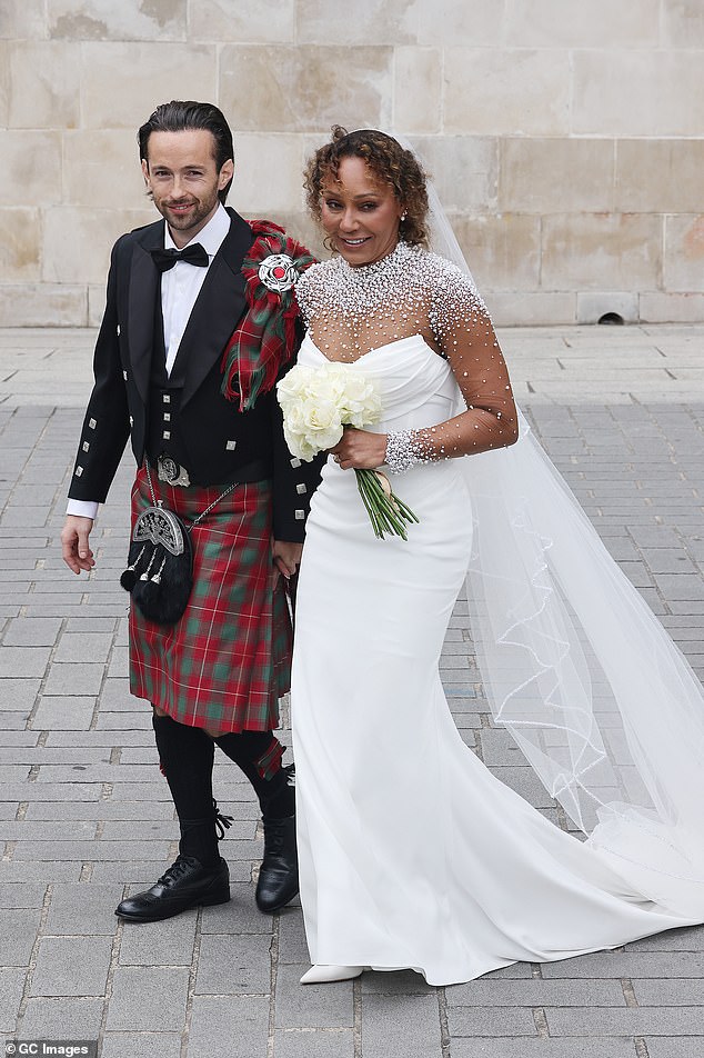Speaking exclusively to Daily Mail Australia, Hughes revealed there were a few unexpected moments inside the ceremony that didn't make it to social media. Mel is pictured at her wedding with Rory McPhee