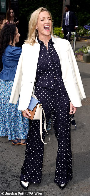 She oozed sophistication in the look which she teamed with heels and a colourful handbag