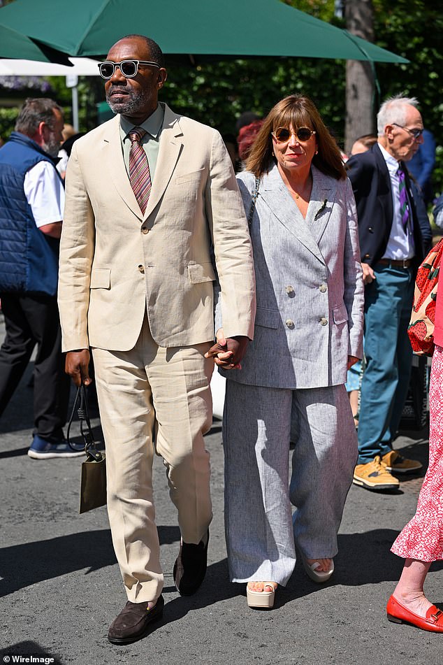Meanwhile actor Lenny and partner Lisa both matched in summer suits and shades as they soaked up the sunshine