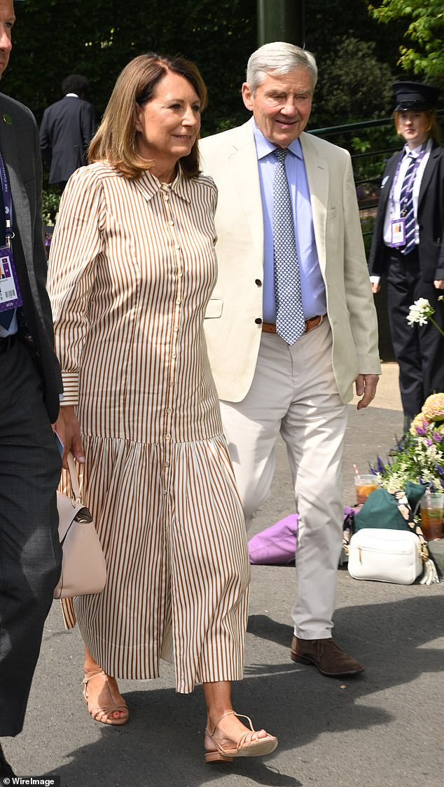 The parents of the Duchess of Cambridge both matched in stylish beige ensmebles as they were spotted strolling through the crowd