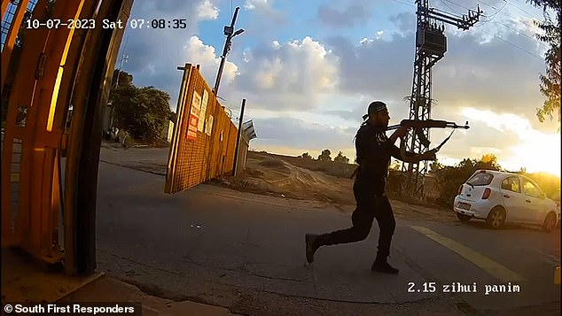 Video showed a group of people being ambushed by three gunmen who are seen running towards them carrying what appear to be Kalashnikov assault rifles