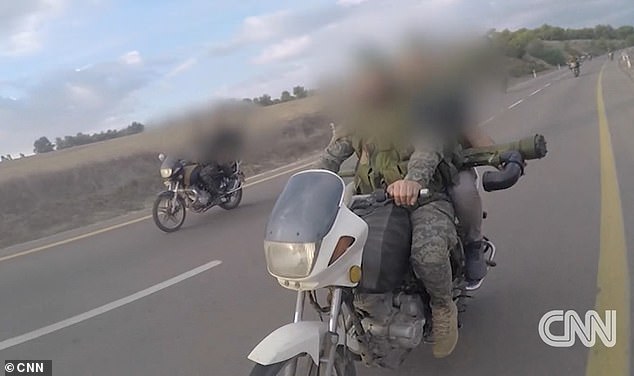 Video footage taken by Hamas and shared by the IDF showed gunmen raiding Israel in 2023