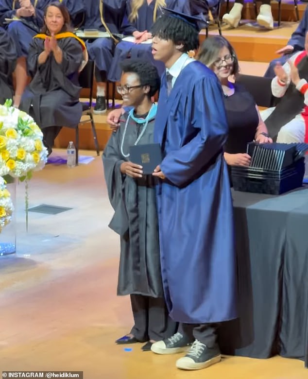 The teenager wore a classic gown and mortar for the ceremony, held at the Walt Disney Concert Hall in downtown LA amid violent ICE raid protests