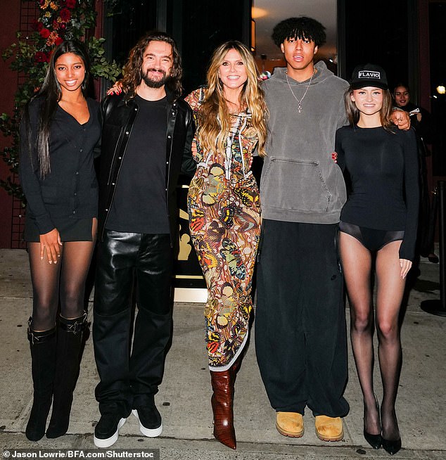 Pictured: Lou Samuel, Tom Kaulitz, Heidi Klum, Johan Samuel, Leni Klum at the opening of Crazy Pizza NYC in October 2024
