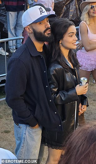 She paired it with an oversized leather jacket