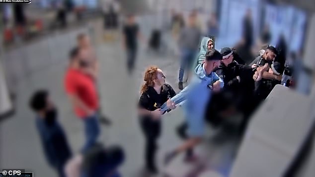 As Pc Marsden attempted to gain control of Amaaz in order to arrest him, he said he felt an 'immense weight' pressing on him from behind ¿ coming from his brother Amaad (pictured bottom right grappling with an officer in CCTV footage)