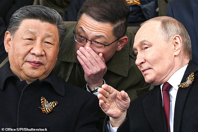 Russia's President Vladimir Putin (R) and Chinese President Xi Jinping (L) attend the Victory Day military parade at Red Square in central Moscow, on Friday, on May 9, 2025