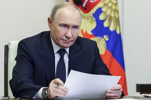 Russian President Vladimir Putin leads a cabinet meeting via videoconference at the Novo-Ogaryovo state residence outside Moscow, Russia, Wednesday, June 4, 2025
