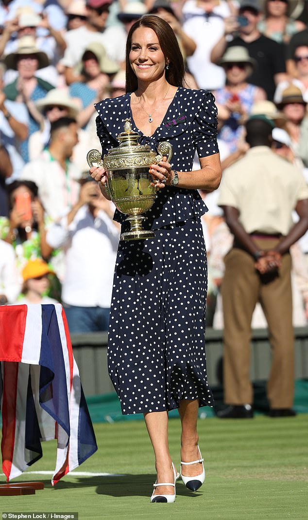 She added a touch of glitz by wearing a necklace and drop earrings with sapphires that belonged to Princess Diana