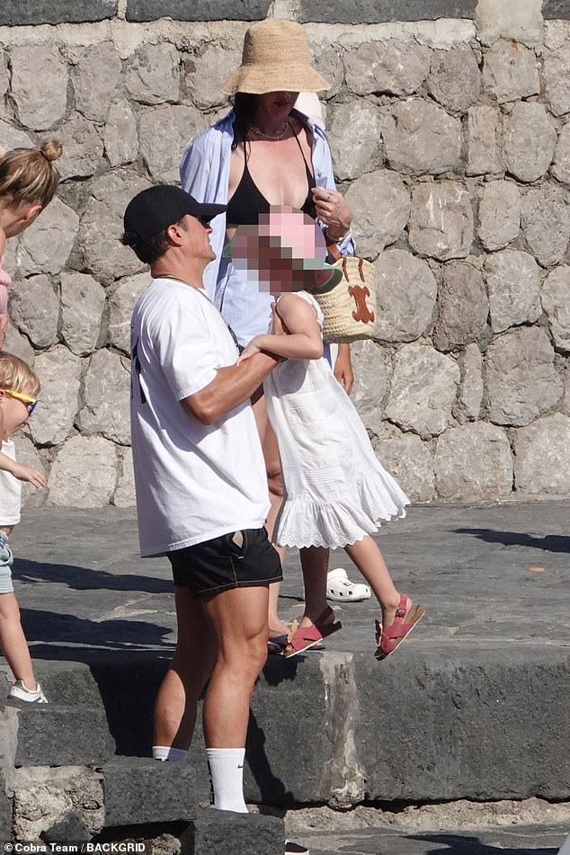 The 40-year-old pop star and 48-year-old actor made a united stand as they were joined by four-year-old daughter Daisy Dove