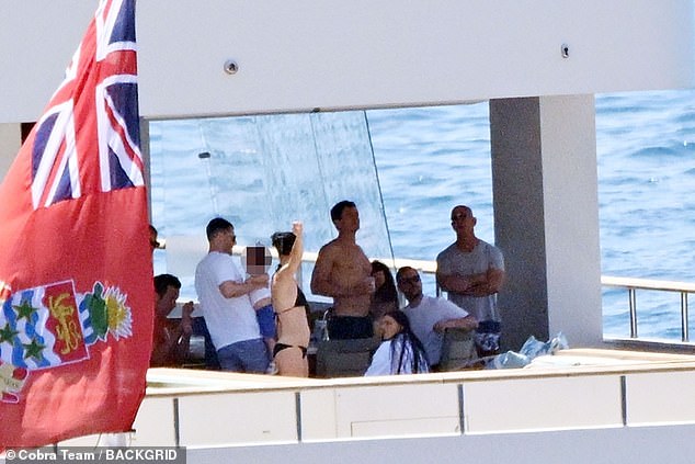 There were plenty of people hanging out on the luxury cruiser with the newlyweds