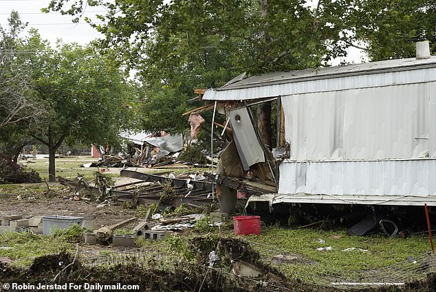 Photos of the trailer home taken by the Daily Mail show the catastrophic damage it suffered