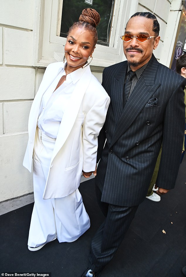 Joined by R&B singer Maxwell, Janet showed off her recent weight loss in the stylish suit