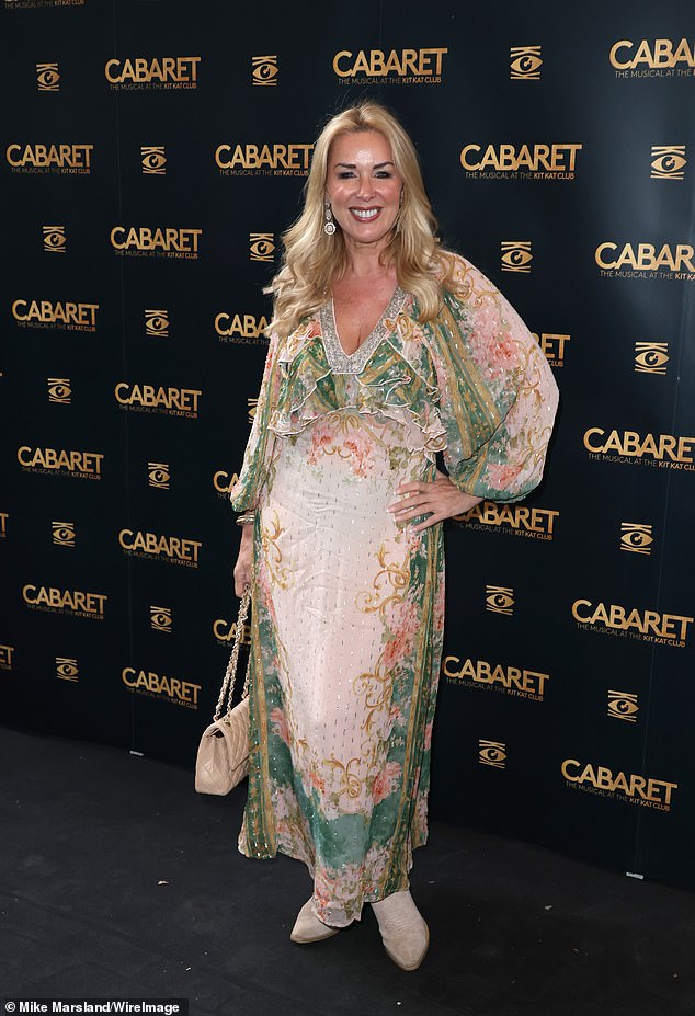 Showing off her boho-inspired fashion sense, Claire posed up a storm in a plunging summer dress with a floral print