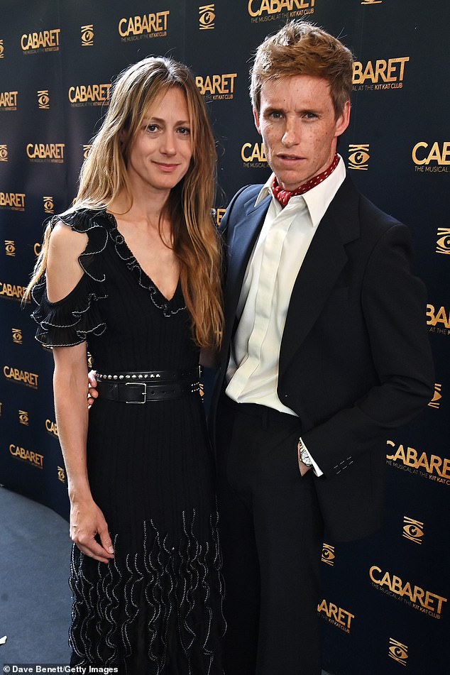 The Oscar winner was dressed in a sharp navy blue suit and an ascot scarf, while Hannah opted for a chic black frilled dress