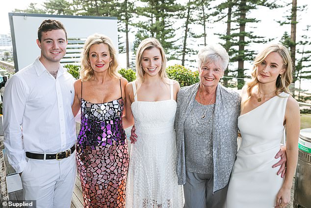 Every morning at 6am, Sharon (second from left) heads to Manly Beach for an ocean swim with friends. She also works out with a personal trainer three times a week