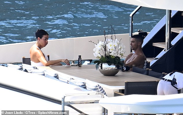 Ronaldo and his partner Georgina are locked in a discussion as they holiday in Spain