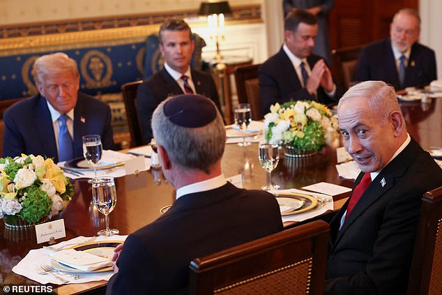Israeli Prime Minister Benjamin Netanyahu looks on during a bilateral dinner with U.S. President Donald Trump, at the White House in Washington, D.C., U.S., July 7, 2025