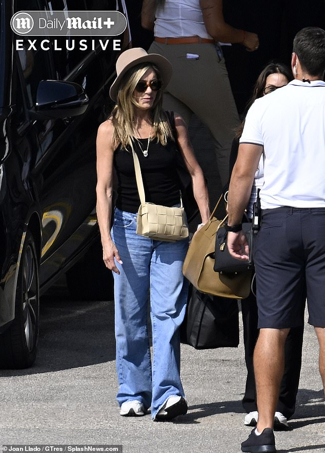 The star looked radiant as she headed out with Curtis