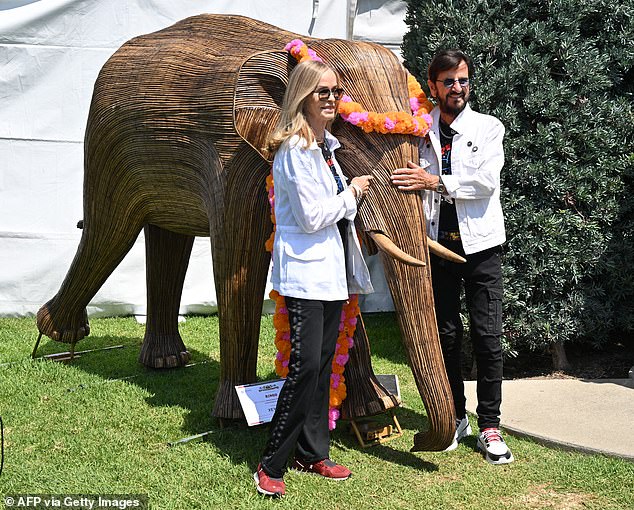 The former Beatle was also snapped in front of a life-size Indian elephant sculpture from the Great Elephant Migration Art Exhibition, which is raising awareness of conservation efforts
