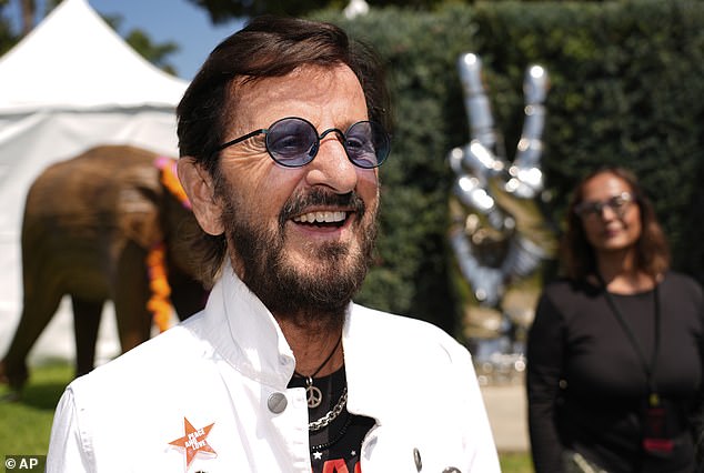 Ringo, whose real name is Richard Starkey, was still echoing the swinging 1960s in his choice of outfit and wore a peace sign necklace and tinted oval sunglasses
