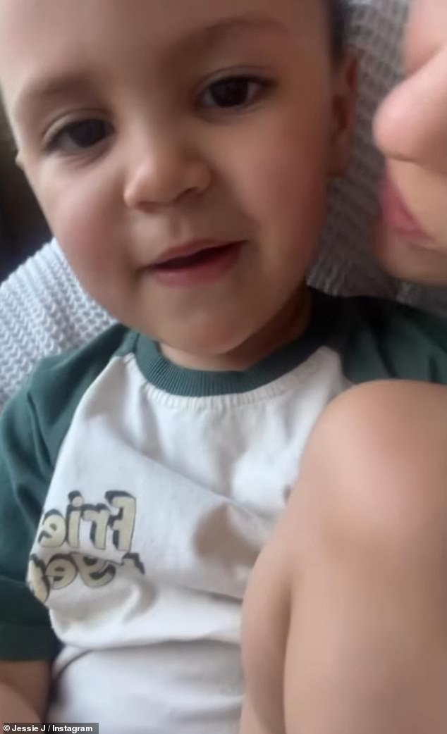 In the sweet clip, Jessie is heard encouraging her boy to say 'Mummy's going to be okay' as she prepared for the surgery to remove her breast