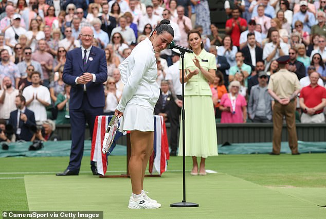 Jabeur with her trophy in their Ladies' Singles Final during day thirteen of The Championships Wimbledon 2023