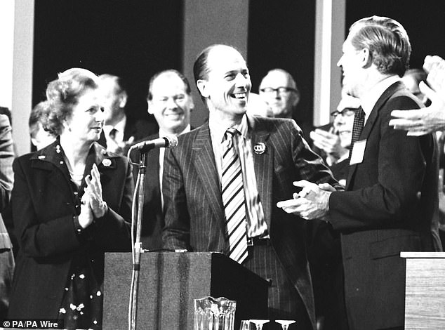 Norman Tebbit is joined by Margaret Thatcher and Cecil Parkinson as he receives a standing ovation after his speech at the Conservative Party Conference in 1981. In 1983, Tebbit replaced Parkinson as Trade Secretary, when Parkinson resigned over an affair with his secretary