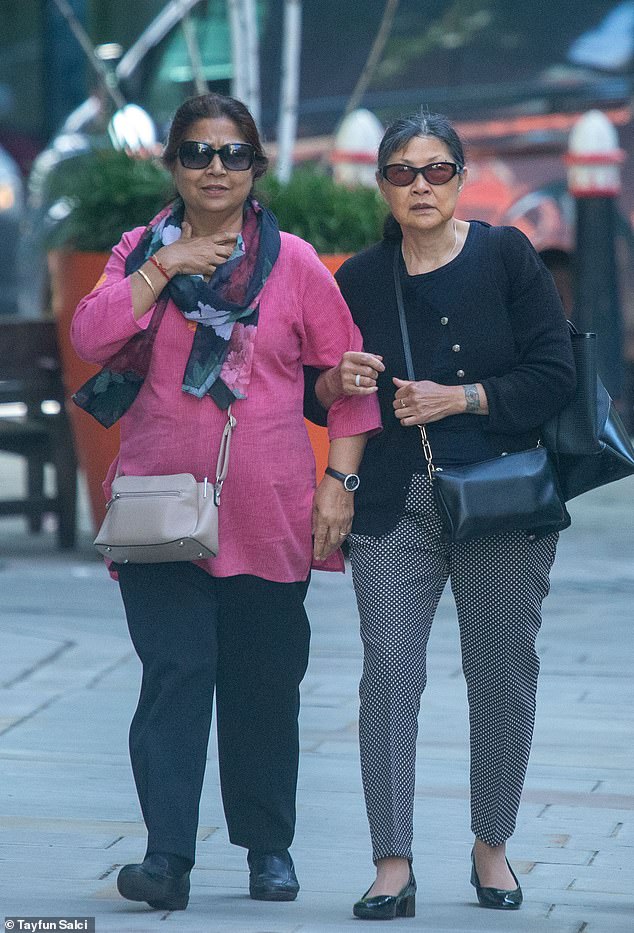 Fong Yuet Cockell (right) pictured arriving at the High Court in London last month