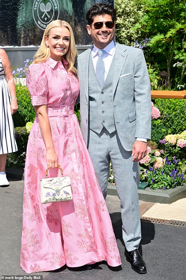 Jenkins looked radiant in a pastel pink summer dress with a distinctive cinched waistline