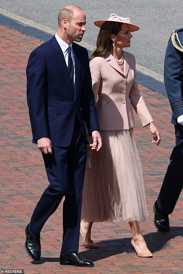 Meanwhile William, also 43, was smartly turned out in a formal suit