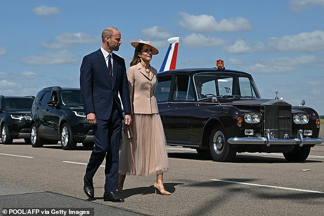 Kate paired her smart Dior blazer today with a flowing skirt and nude heels
