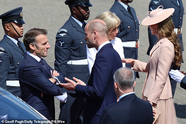 The President of France Emmanuel Macron and his wife Brigitte Macron are welcomed by the Prince and Princess of Wales at RAF Northolt, north London