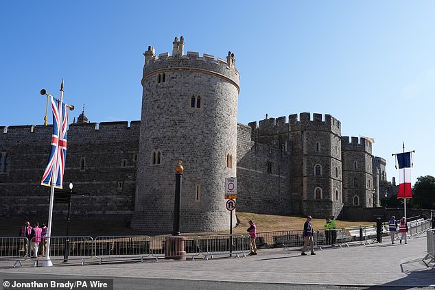 Windsor Castle is pictured this morning ahead of the arrival of Emmanuel and Brigitte Macron