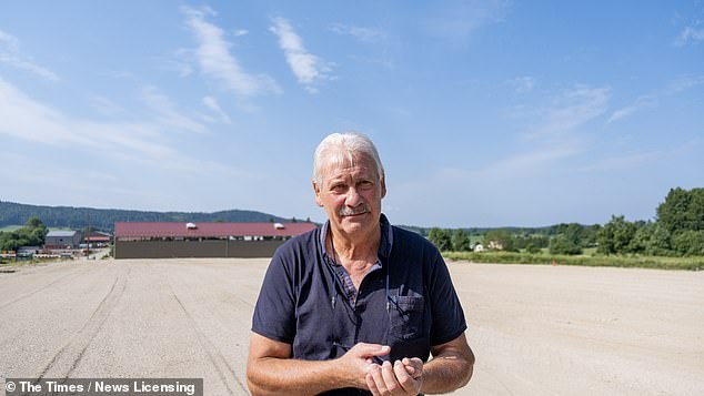 Mayor Roger Belot is having use village money to accommodate cross-border workers in a formal campsite where he can, at least, charge
